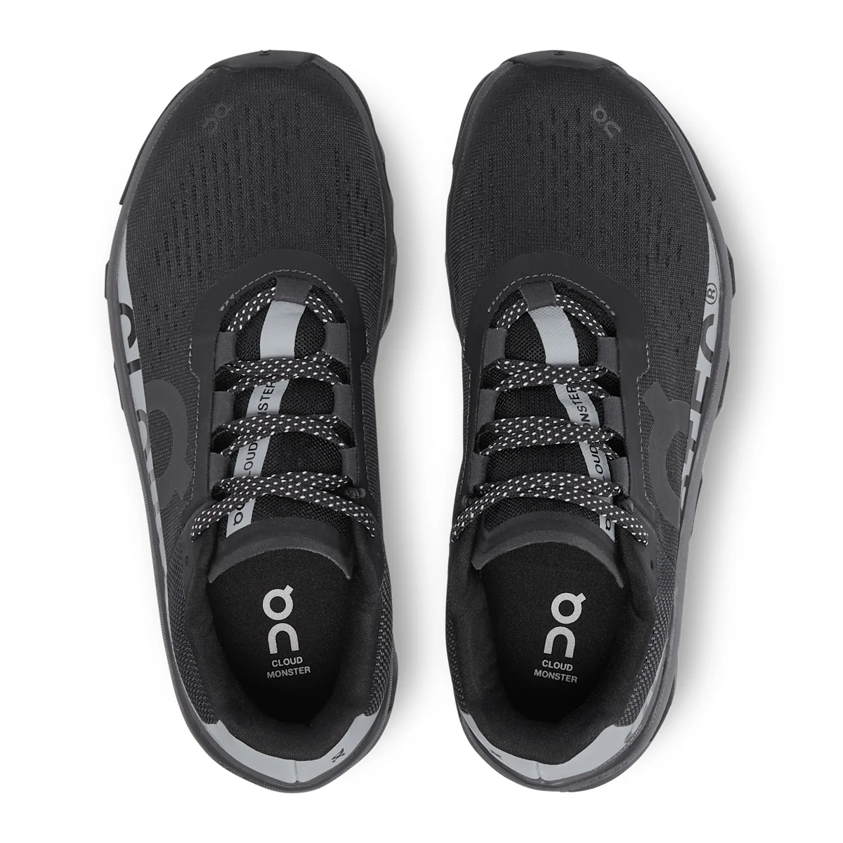On Cloudmonster Lumos - Nero Max CloudTec® for big rebounds – plus a reflective stripe.